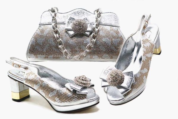 silver women pumps and bag set with rhinestone bowtie design african shoes match handbag for dress x42,heel 7.5cm, Black
silver women pumps and bag set with rhinestone bowtie design african shoes match handbag for dress x42,heel 7.5cm, Black