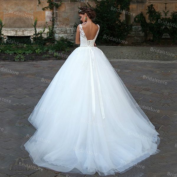 modest white backless wedding dresses with lace elegant full length tulle garden bridal gowns a line v neck sheer straps country bride robe
modest white backless wedding dresses with lace elegant full length tulle garden bridal gowns a line v neck sheer straps country bride robe