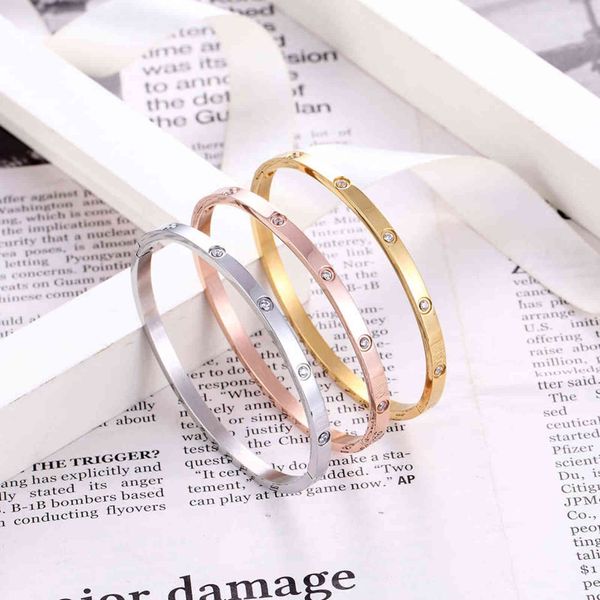 quality 4mm wide inlaid with 10 zircon gold woman bangle stainless steel bracelets & for women wedding party jewelry, Golden;silver
quality 4mm wide inlaid with 10 zircon gold woman bangle stainless steel bracelets & for women wedding party jewelry, Golden;silver