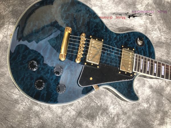 chinese electric guitar custom transparent blue color flame maple mahogany body and neck 6 strings musical instrument
chinese electric guitar custom transparent blue color flame maple mahogany body and neck 6 strings musical instrument