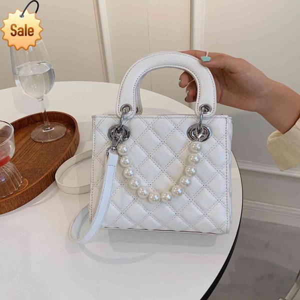 2021 summer trend new korean fashion versatile princess of wales bag ling lattice embroidered thread single shoulder oblique span pearl bag
2021 summer trend new korean fashion versatile princess of wales bag ling lattice embroidered thread single shoulder oblique span pearl bag