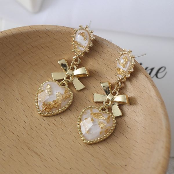 s925 silver needle south korea girl dream resin love ear studs bow tie ear studs
s925 silver needle south korea girl dream resin love ear studs bow tie ear studs