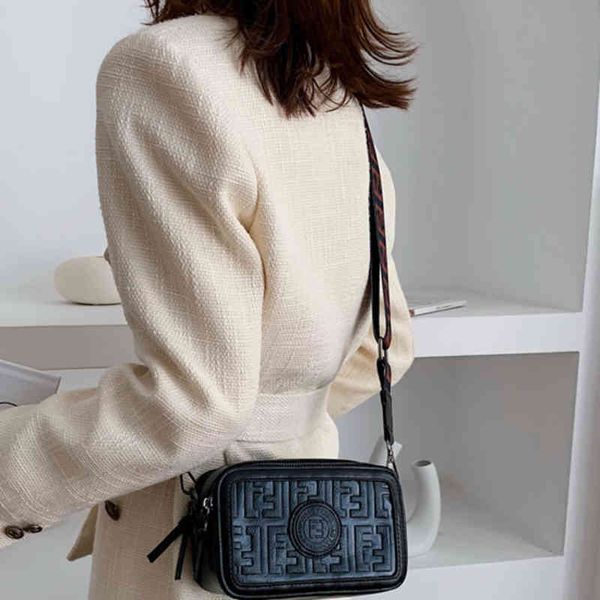 exclusive indentation bag women's new wide shoulder strap messenger sling leisure small square signature camera
exclusive indentation bag women's new wide shoulder strap messenger sling leisure small square signature camera