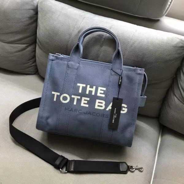 the tote bag mj tote backpack 2021 fashion trend handbag portable zipper design large capacity handbags white canvas bag blue canvas handbag
the tote bag mj tote backpack 2021 fashion trend handbag portable zipper design large capacity handbags white canvas bag blue canvas handbag