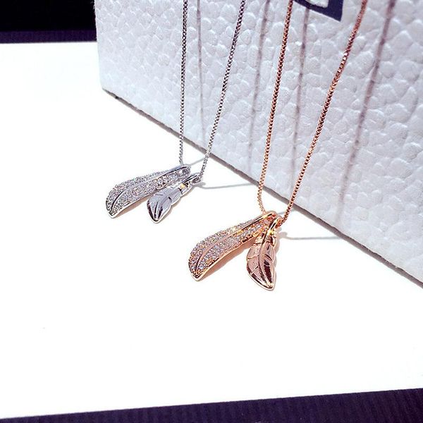 pendant necklaces cute bling zircon stone feather silver color long chain necklace for women fashion jewelry statement choker
pendant necklaces cute bling zircon stone feather silver color long chain necklace for women fashion jewelry statement choker