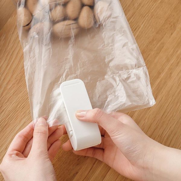 bag clips portable household mini sealing machine plastic package storage travel hand pressure heat
bag clips portable household mini sealing machine plastic package storage travel hand pressure heat