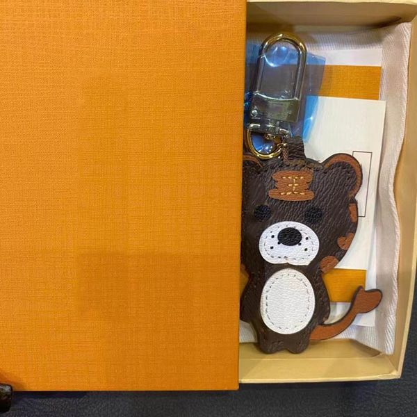 lion tiger monkey bear keychains luxury designer leather key chain laser embossed bag pendants with box 1853, Silver
lion tiger monkey bear keychains luxury designer leather key chain laser embossed bag pendants with box 1853, Silver