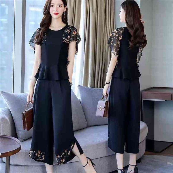 fashion floral two-piece set o-neck short sleeve add wide-leg nine points pants suits female summer clothes y768, White
fashion floral two-piece set o-neck short sleeve add wide-leg nine points pants suits female summer clothes y768, White