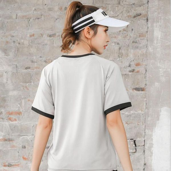 yoga outfit round collar women loose t-shirt quick dry fitness gym running sportswear clothing mujer 
yoga outfit round collar women loose t-shirt quick dry fitness gym running sportswear clothing mujer