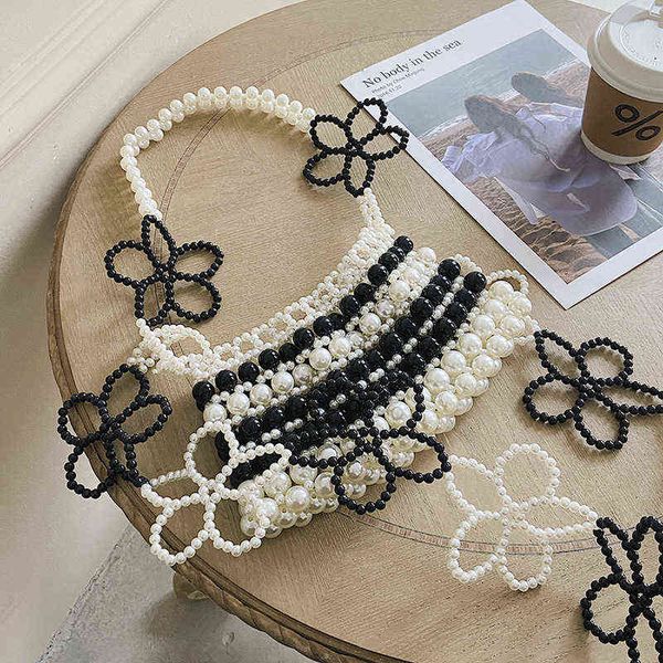 shopping bags beaded bag pearl weaving hollow flower one-shoulder hand-held mobile phone evening handbag detachable chain wholesale availabl
shopping bags beaded bag pearl weaving hollow flower one-shoulder hand-held mobile phone evening handbag detachable chain wholesale availabl