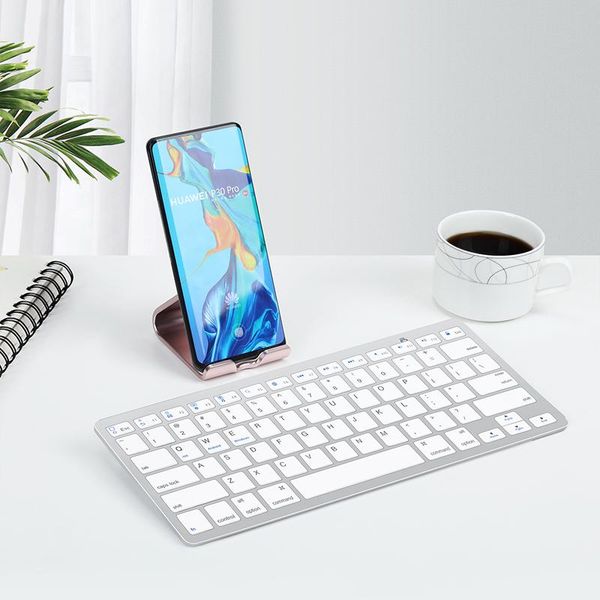 the wireless bluetooth keyboard is cute and portable, suitable for mobile phones, tablets, deskcomputers keyboards
the wireless bluetooth keyboard is cute and portable, suitable for mobile phones, tablets, deskcomputers keyboards