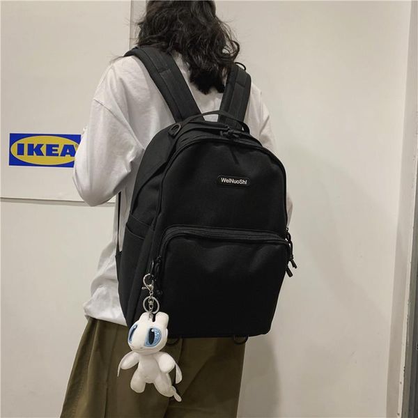 backpack korean version of the fashion simple college style oxford cloth female casual solid color couple pendant school bag
backpack korean version of the fashion simple college style oxford cloth female casual solid color couple pendant school bag