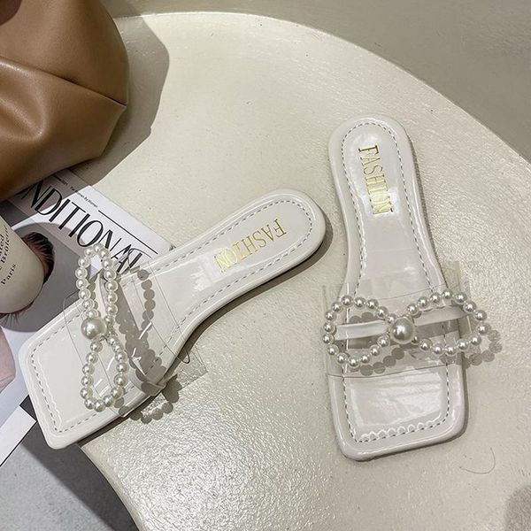 pvc flat slippers women pearl bow transparent open toe slides summer black beige bc186
pvc flat slippers women pearl bow transparent open toe slides summer black beige bc186