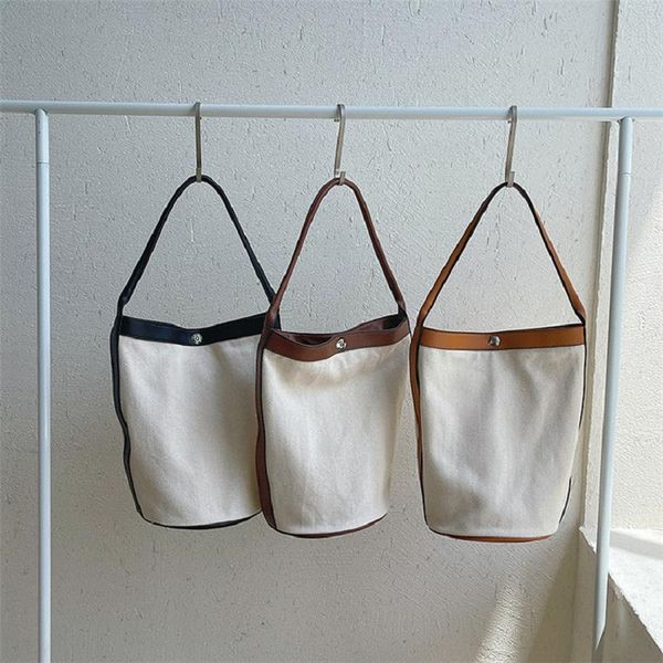 evening bags female bag large capacity casual canvas women purse fashion hit color shoulder cylinder pu stitching bucket 
evening bags female bag large capacity casual canvas women purse fashion hit color shoulder cylinder pu stitching bucket