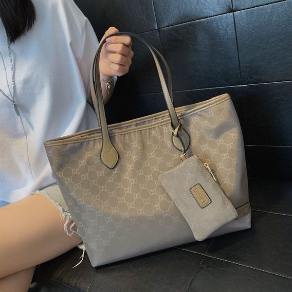 handbag women new oxford cloth one shoulder hand simple letter tote women's purse outlet
handbag women new oxford cloth one shoulder hand simple letter tote women's purse outlet