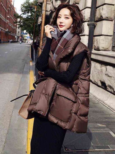 autumn and winter loose light down vest feminine commuting korean st collar sleeveless coat, Black;white
autumn and winter loose light down vest feminine commuting korean st collar sleeveless coat, Black;white