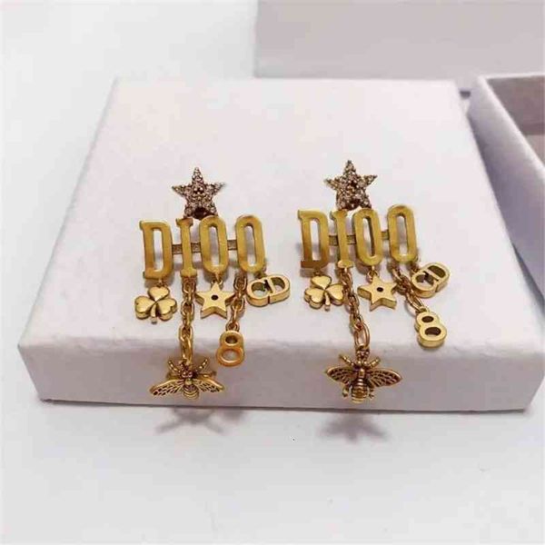 d fashion luxury designer jewelry women's family / di earrings letter star tassel net red temperament bronze, Red;brown
d fashion luxury designer jewelry women's family / di earrings letter star tassel net red temperament bronze, Red;brown