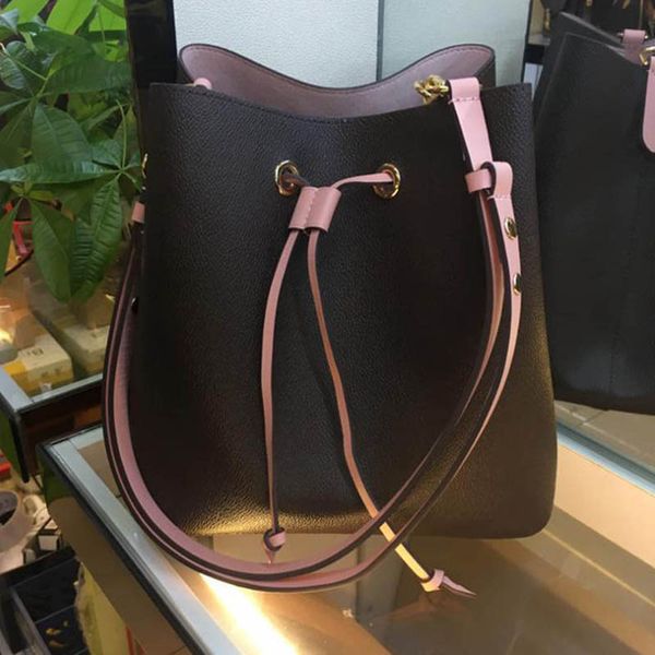 2021 female fashion medium bucket bag letters and monogram floral embossed grain pvc material removable adjustable shoulder or crossbody bag
2021 female fashion medium bucket bag letters and monogram floral embossed grain pvc material removable adjustable shoulder or crossbody bag