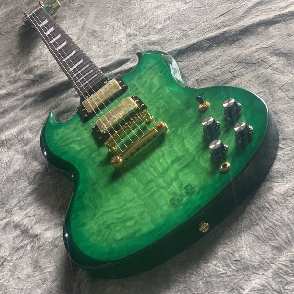 mahogany solid guitar, green, big flower finish, rosewood fingerboard, gold color hardware
mahogany solid guitar, green, big flower finish, rosewood fingerboard, gold color hardware
