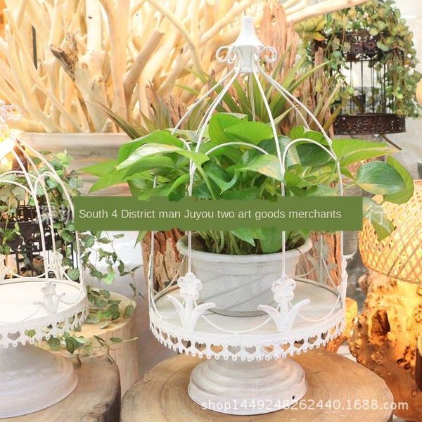 antique and old-fashioned american iron birdcage flower basket, strong durable, fleshy flowerpot furnishings in home bird cages
antique and old-fashioned american iron birdcage flower basket, strong durable, fleshy flowerpot furnishings in home bird cages