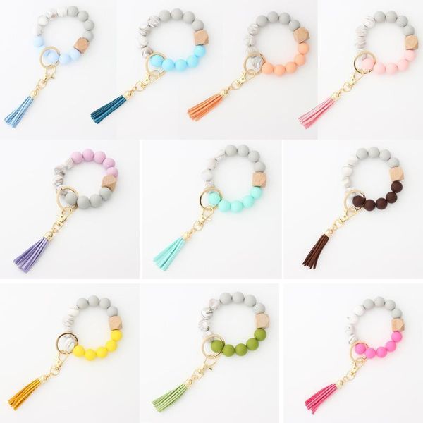 party favor keychain wooden tassel string chain food grade silicone bead women girl key ring wrist strap bracelet
party favor keychain wooden tassel string chain food grade silicone bead women girl key ring wrist strap bracelet