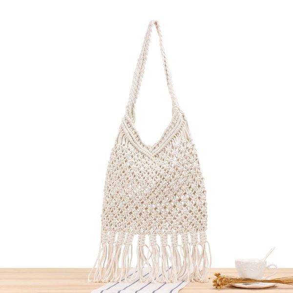 hollow hand-woven mesh tassel shoulder beach trendy female mori style straw bag evening bags
hollow hand-woven mesh tassel shoulder beach trendy female mori style straw bag evening bags