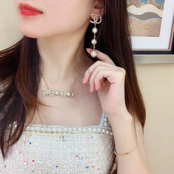 c2135 pendant tassel chain earrings women's high-end fashion accessories charm long golden pearl lettering earrings, Golden;silver
c2135 pendant tassel chain earrings women's high-end fashion accessories charm long golden pearl lettering earrings, Golden;silver