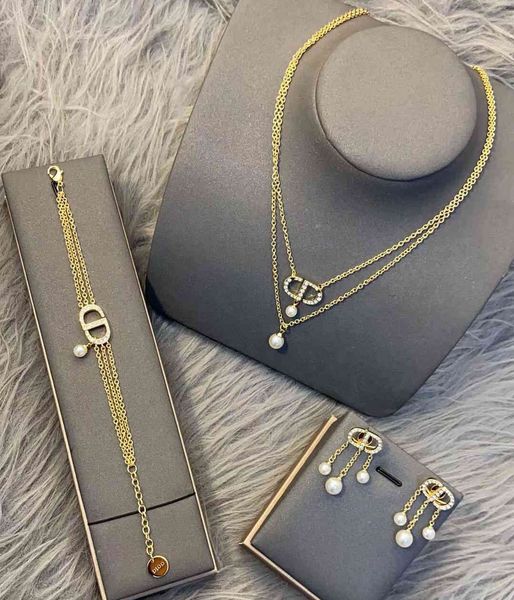 21 new diamond inlaid letter pearl necklace women's net red same fashion plated 18k bracelet earrings, Silver
21 new diamond inlaid letter pearl necklace women's net red same fashion plated 18k bracelet earrings, Silver