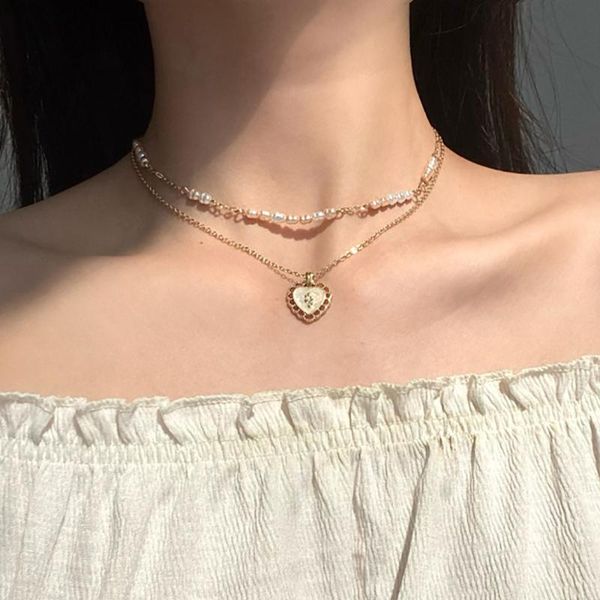 pendant necklaces en trendy sweet vintage multi-layer pearl necklace for women gold color heart-shaped chain choker fashion jewelry, Silver
pendant necklaces en trendy sweet vintage multi-layer pearl necklace for women gold color heart-shaped chain choker fashion jewelry, Silver