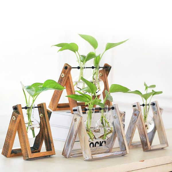 hydroponic vase, deskplant terrarium glass planter bulb vase with wooden stand for hydroponics plants style 2021 vases
hydroponic vase, deskplant terrarium glass planter bulb vase with wooden stand for hydroponics plants style 2021 vases