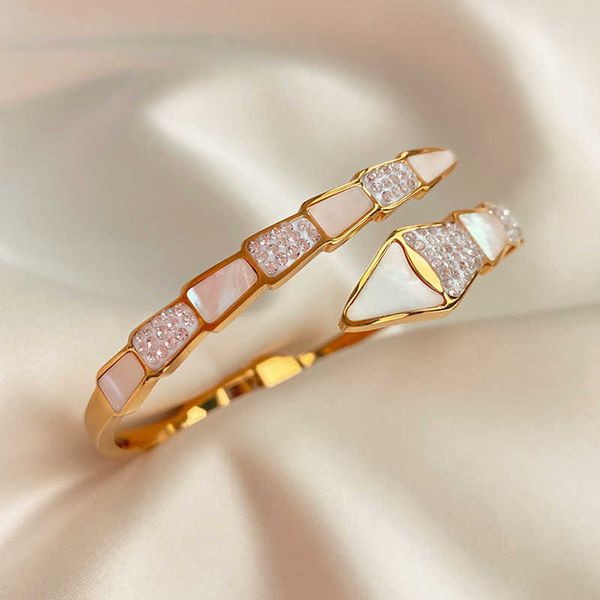 bracelets for women shell inlaid with zircon snake bone lattice stainless steel open rose gold bangles femme trend fashion q0717, Black
bracelets for women shell inlaid with zircon snake bone lattice stainless steel open rose gold bangles femme trend fashion q0717, Black