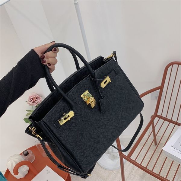 70% off factory store litchi pattern 30cm buckle hand shoulder bag 25cm
70% off factory store litchi pattern 30cm buckle hand shoulder bag 25cm