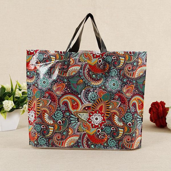 gift wrap plastic clothing handbag hand length handle packing bag custom made logo boys and girls shopping
gift wrap plastic clothing handbag hand length handle packing bag custom made logo boys and girls shopping