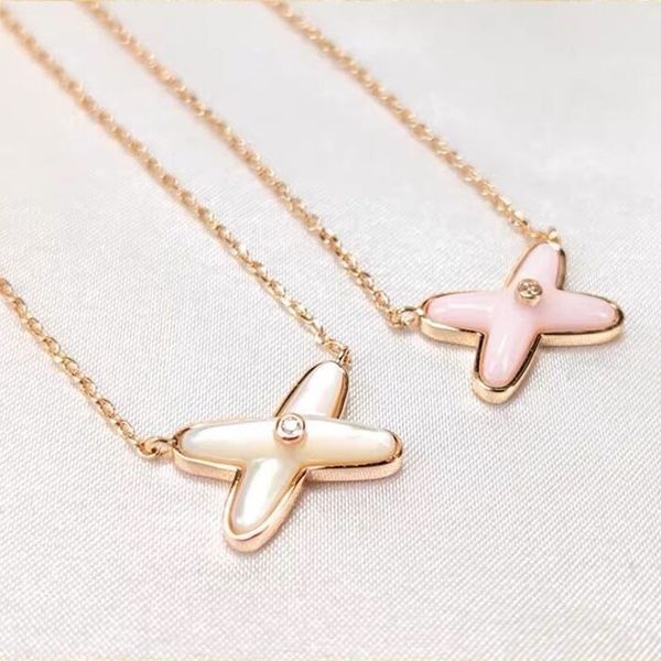 xiaoshangjia crossed letter necklace for women 925 sterling silver plated 18k rose gold white fritillaria x-shaped pendant clavicle chain
xiaoshangjia crossed letter necklace for women 925 sterling silver plated 18k rose gold white fritillaria x-shaped pendant clavicle chain