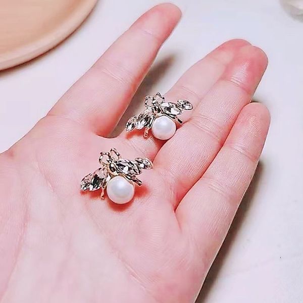 75%off outlet online925 silver needle family bee pearl new fashion simple women's small net red earrings, Golden
75%off outlet online925 silver needle family bee pearl new fashion simple women's small net red earrings, Golden