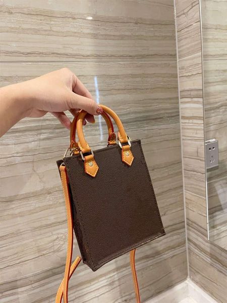 wome luxurys mini handbags real leather designers flower tote musicbags messenger crossbody shoulder bag totes purse wallets, Red;black
wome luxurys mini handbags real leather designers flower tote musicbags messenger crossbody shoulder bag totes purse wallets, Red;black