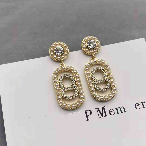 luxury designer fashion d family pearl cd letter inlaid diamond simple wind net red same earrings, Red;brown
luxury designer fashion d family pearl cd letter inlaid diamond simple wind net red same earrings, Red;brown