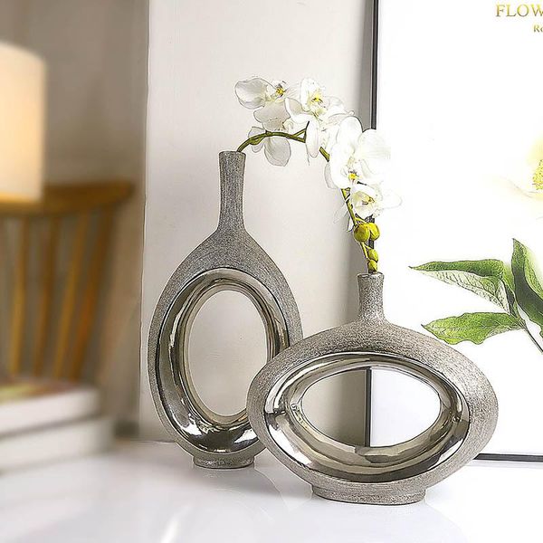 creative ceramic vase silver hollow drawing flower simple study table decoration modern home accessories vases
creative ceramic vase silver hollow drawing flower simple study table decoration modern home accessories vases