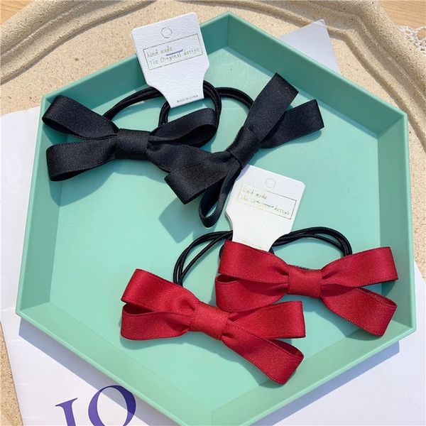 1 pair children's simple red and black ribbon fabric bowknot hair rope rubber band headwear fashion sweet girl hair accessories, Slivery;white
1 pair children's simple red and black ribbon fabric bowknot hair rope rubber band headwear fashion sweet girl hair accessories, Slivery;white