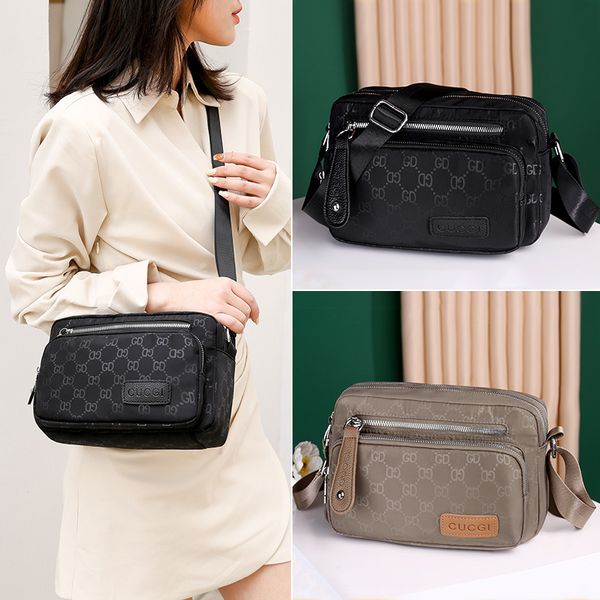 single shoulder bag women's new oxford cloth shoulder messenger bag simple and light letter storage mother's purse outlet
single shoulder bag women's new oxford cloth shoulder messenger bag simple and light letter storage mother's purse outlet