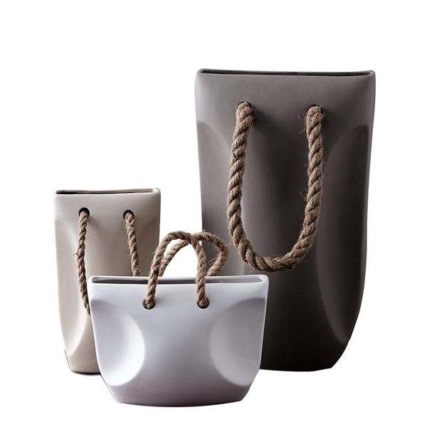 vases handbag design art ceramic vase home decor carfts porcelain flower ornaments living room counterwedding decorations
vases handbag design art ceramic vase home decor carfts porcelain flower ornaments living room counterwedding decorations