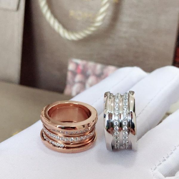 famous original spiral zircon alloy ring bvl classic fashion romantic couple with logo cluster rings, Golden;silver
famous original spiral zircon alloy ring bvl classic fashion romantic couple with logo cluster rings, Golden;silver