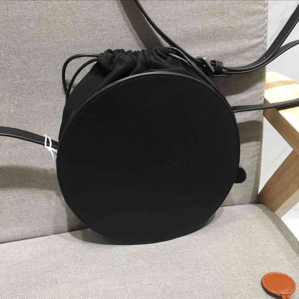 mori's round small messenger bag, real leather women's shoulder bag, fashionable and simple
mori's round small messenger bag, real leather women's shoulder bag, fashionable and simple