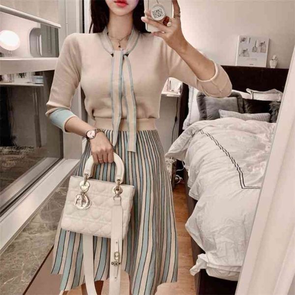 autumn winter 2 piece sets elegant bow lace up long sleeve pullovers knitting sweater+high waist striped midi skirt set suits 210519, White
autumn winter 2 piece sets elegant bow lace up long sleeve pullovers knitting sweater+high waist striped midi skirt set suits 210519, White