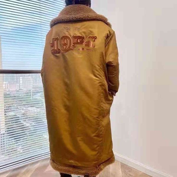 autumn/winter 2021 women's long trench coat tobacco color 1951 reversible teddy bearskin cotton-padded, Tan;black
autumn/winter 2021 women's long trench coat tobacco color 1951 reversible teddy bearskin cotton-padded, Tan;black