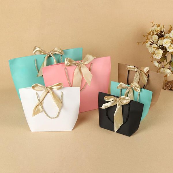 gift wrap 5pcs/pack bag pouch wedding party favor present clothes handles bow ribbon paper shopping thicken table decoration
gift wrap 5pcs/pack bag pouch wedding party favor present clothes handles bow ribbon paper shopping thicken table decoration