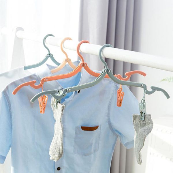 laundry bags 8pcs portable folding coat hanger magic multi-function clothes drying rack plastic hangers home organizer
laundry bags 8pcs portable folding coat hanger magic multi-function clothes drying rack plastic hangers home organizer