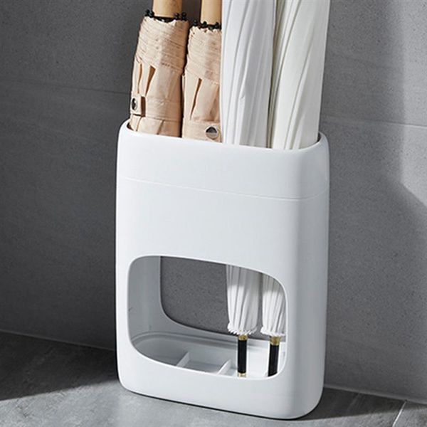 white umbrella rack indoor holder stand with removable drip tray 
white umbrella rack indoor holder stand with removable drip tray