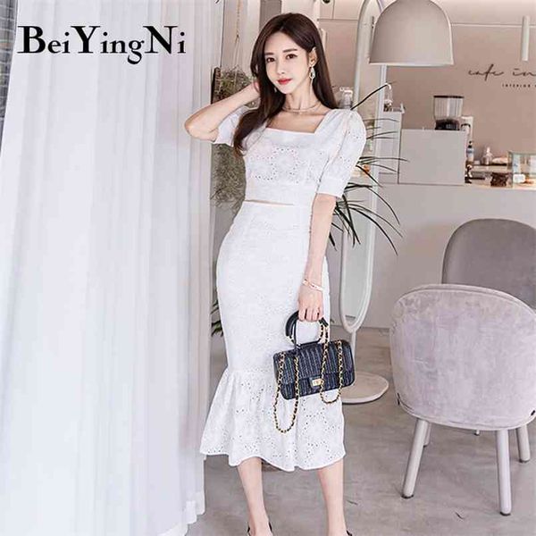fashion 2 piece set women lace midi skirt white hollow out package hip cropped t shirts female saia faldas ol 210506
fashion 2 piece set women lace midi skirt white hollow out package hip cropped t shirts female saia faldas ol 210506