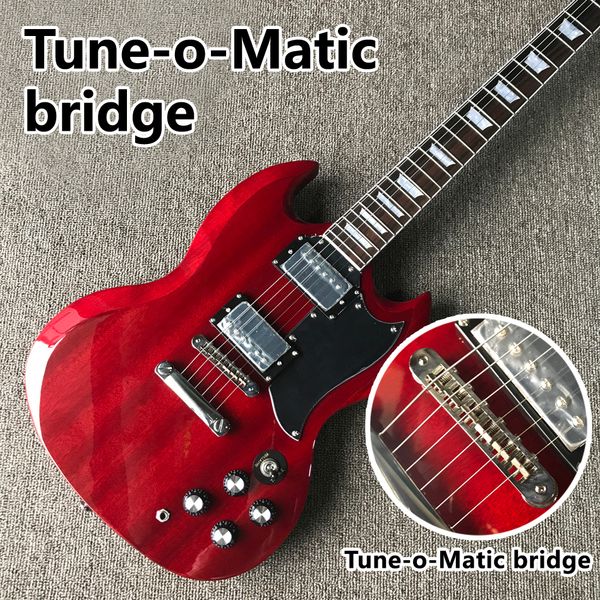 rosewood fingerboard electric guitar, gold hardware, tune-o-matic bridge, solid mahogany body
rosewood fingerboard electric guitar, gold hardware, tune-o-matic bridge, solid mahogany body